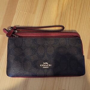Red and brown leather women's Coach wallet
